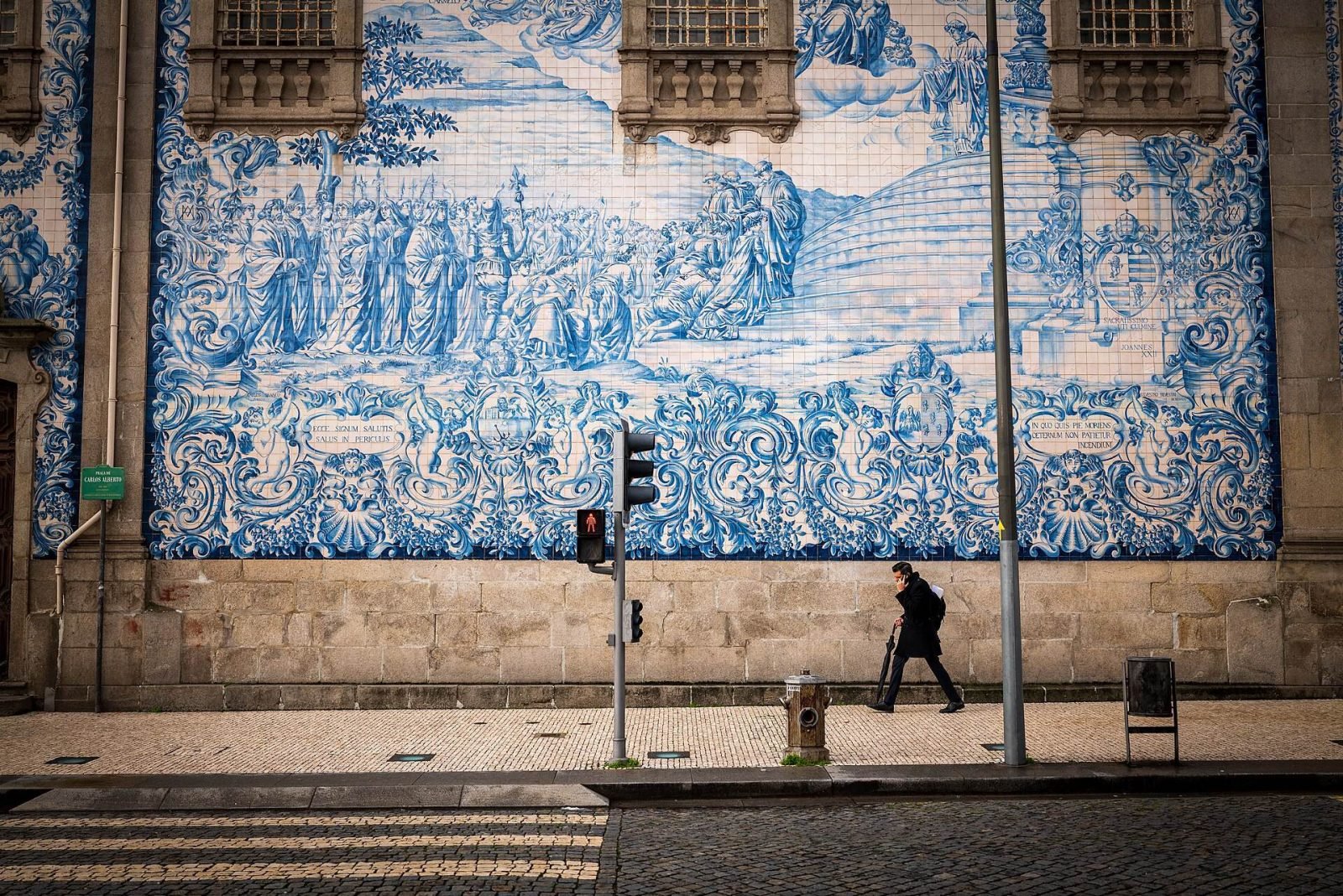 A wall of traditional blue and white azulejo tiles in Porto