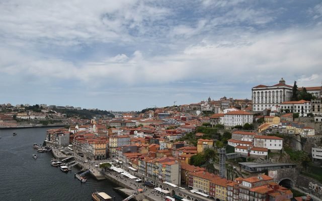 Ribeira’s rooftops and the Douro seen from the upper deck of the Dom Luís I Bridge