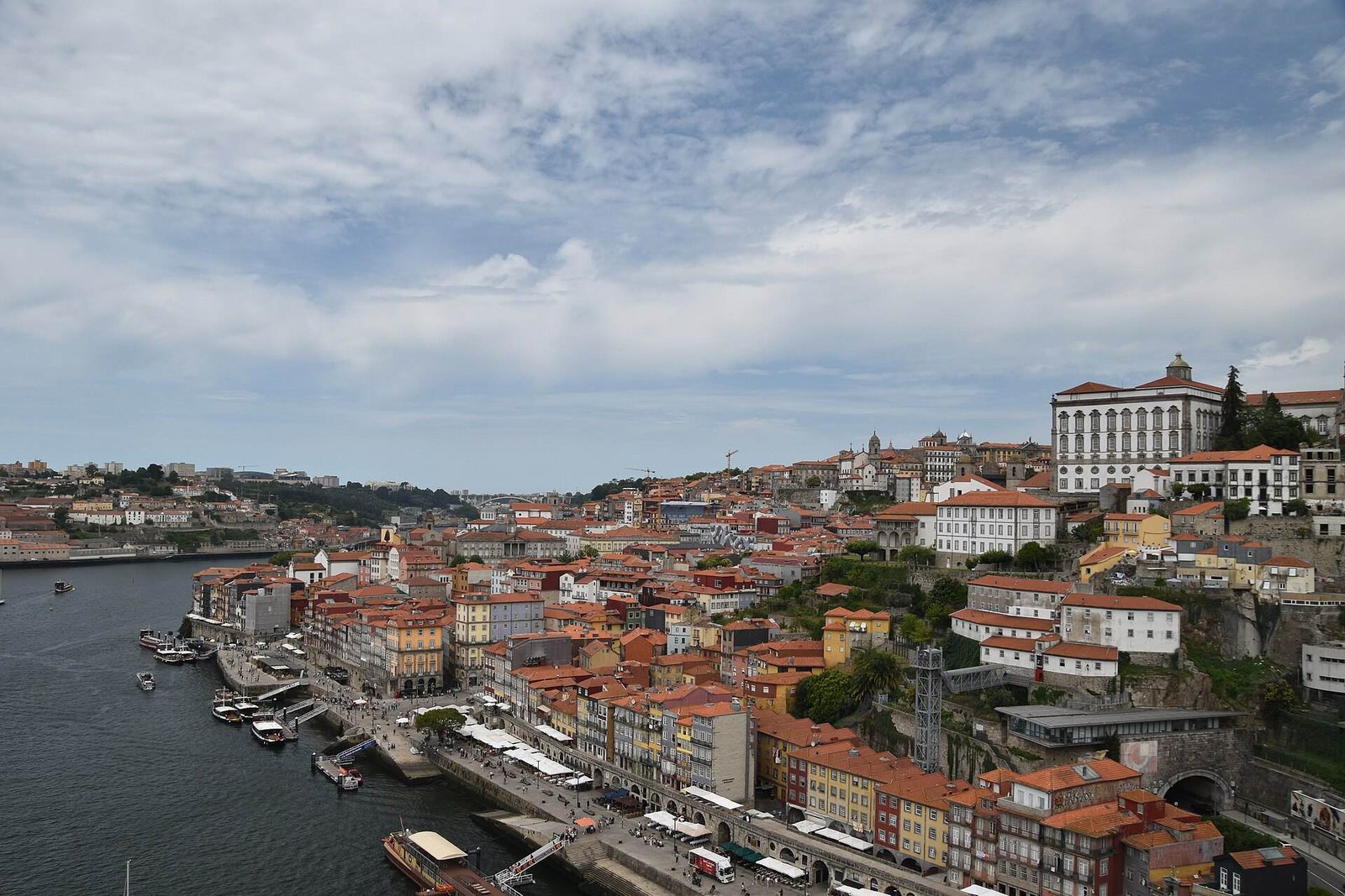 Ribeira’s rooftops and the Douro seen from the upper deck of the Dom Luís I Bridge