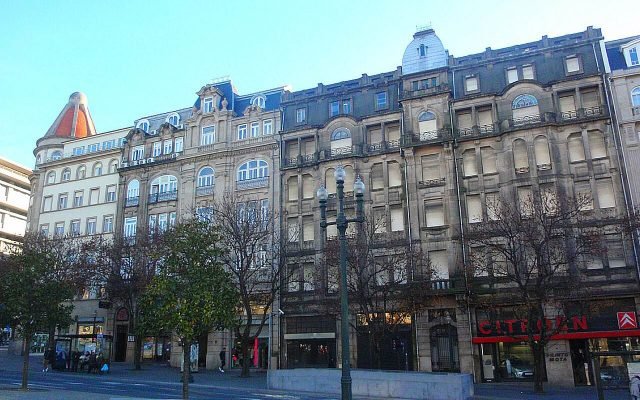Grand early 20th-century buildings along Avenida dos Aliados