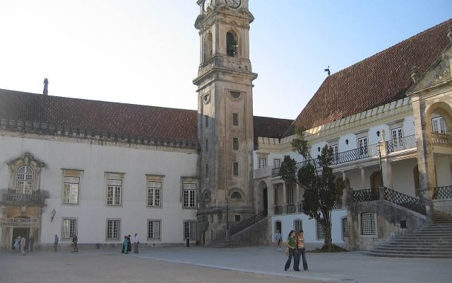 The clock tower of the University of Coimbra above its courtyard