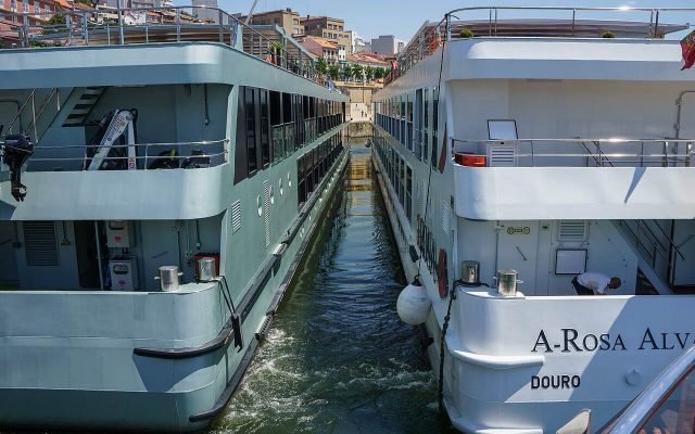River cruise boats moored side by side at Peso da Régua on the Douro