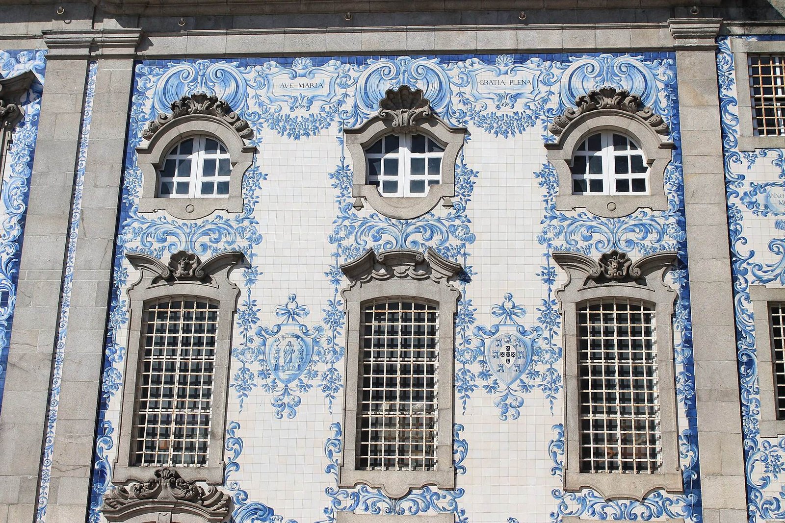 Blue and white azulejo tiles covering the façade of the Igreja do Carmo