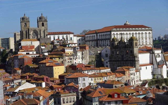 Porto’s red rooftops and the cathedral towers seen from Miradouro da Vitória