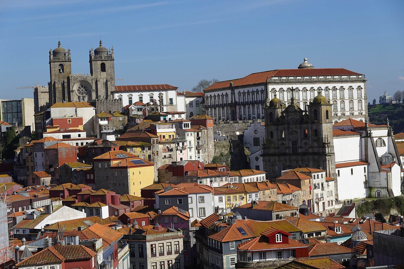 Porto’s red rooftops and the cathedral towers seen from Miradouro da Vitória
